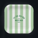 Tis The SeaSon Custom Beach Christmas Green Stripe Paper Plate<br><div class="desc">The ’Tis The Sea-Son Custom Beach Christmas Green Stripe Paper Plates add festive flair and seaside charm to your holiday celebrations. Featuring a playful green cabana stripe design with customizable beach name and year, these durable paper plates are perfect for serving meals, appetizers, or desserts. Convenient and disposable yet stylish...</div>