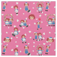 Raggedy Ann et Andy sur des cœurs qui tombent sur