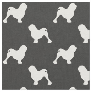 Tissu Silhouettes de race de chien Lowchen à motifs