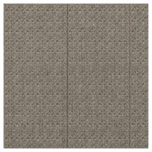 Tissu Un tapis marron avec un motif géométrique est part