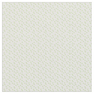 Tissu Une dispersion de carrés vert pâle sur blanc.