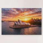 Title Sydney Opera House Sunset Aerial Photography Jigsaw Puzzle<br><div class="desc">Enjoy a relaxing and rewarding challenge with this stunning jigsaw puzzle featuring a breathtaking aerial view of the iconic Sydney Opera House at sunset. Captured above the beautiful waters of Sydney Harbour in Sydney, Australia, this high-definition photograph highlights the famous sail-shaped architecture glowing in warm golden evening light. The dramatic...</div>