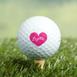 Titleist Pro V1 women's golf balls with pink heart<br><div class="desc">Titleist Pro V1 women's golf balls with pink heart. Personalized golf gifts for her. Add your own name or initial letters. Fun Birthday gift idea for golfers and golfing fans. Neon pink or custom colour design. Also available on other good brands like Wilson, Callaway, Bridgestone, Srixon etc. Create them for...</div>