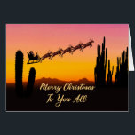 To You All Christmas Santa Over Desert<br><div class="desc">A Christmas card for you to send to a group of friends or relatives. Santa flying over the desert. Lots of tall cactus are seen in silhouette. Wish a merry Christmas from the desert with a lovely sunset coloured card.</div>