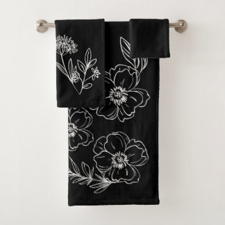 Toallas negras con flores blancas personalizables