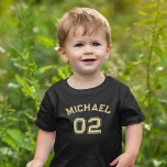 Toddler Boy Girl Name Jersey Number Sports Cotton Toddler T-shirt<br><div class="desc">Create your own custom, personalized, cool, unisex sizing, modern, stylish faux gold typography / font / script, monogrammed player name jersey number classy black, 100% combed ring spun fine jersey soft cotton t-shirt tee shirt. Simply type in your name / kids name / player name and player jersey number, to...</div>