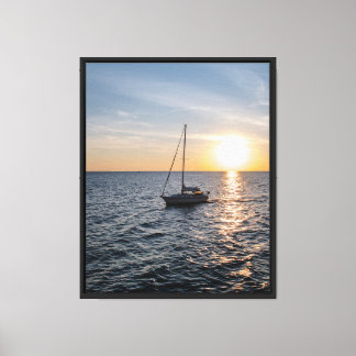 Toile Bateau naviguant vers le coucher du soleil Impress