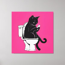 Chat assis sur une toilette