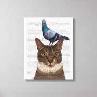 Chat avec pigeon sur tête