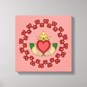Toile Claddagh et nœud rouge sur fond rose