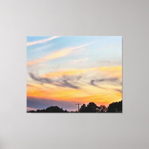 Toile Coucher de soleil coloré sur les arbres
