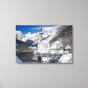 Toile Église dans la neige avec les Alpes
