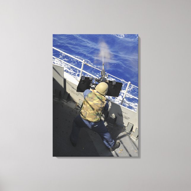 Toile Gunners Mate tirant une mitrailleuse de calibre 50 (Recto)
