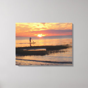 Toile Homme sur un stand up paddle sur la plage du cap C