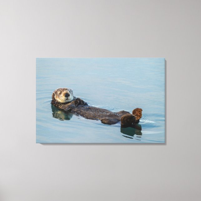Toile La loutre de mer flottant sur le dos dans l'océan (Recto)