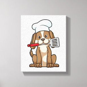 Toile Le chien cuisinier avec le casquette et la spatule