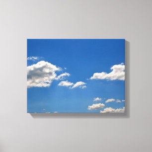 Toile Le ciel est bleu et les nuages blancs passent