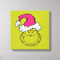Le Grinch avec un chapeau de Père Noël rose