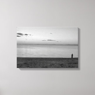 Toile Lone Figure Standing on Beach Canvas Print