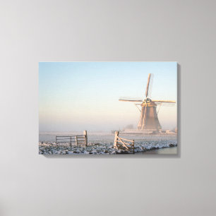 Toile Moulin à vent dans la neige au lever du soleil imp