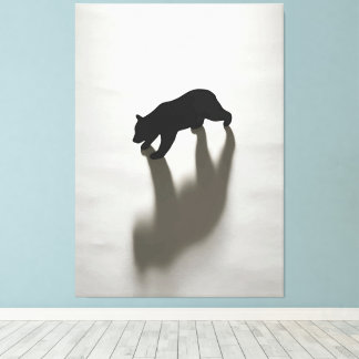 Toile Ombre d'ours noir dans une blanche solitude