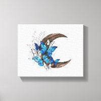 Papillons bleus sur croissant en bois
