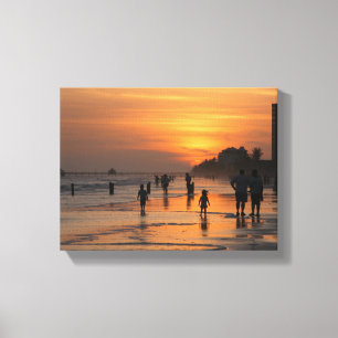Toile Silhouette sur la plage au soleil
