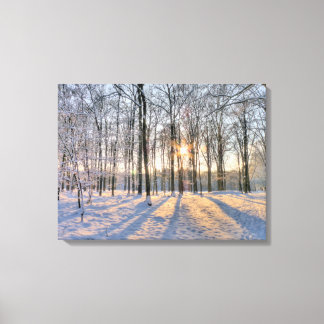 Toile Soleil d'hiver en forêt de neige