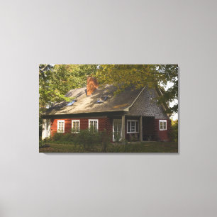 Toile Une maison rouge de rondin