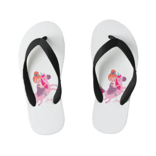 Tongs Enfants Jolie fille aux cheveux orange chevauchant une lic