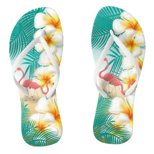 Tongs Flamants roses sur une plage tropicale Turquoise