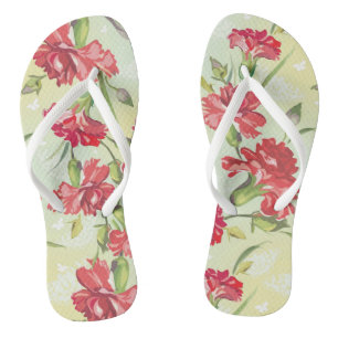 Tongs Oeillets rouges sur le vert avec des papillons