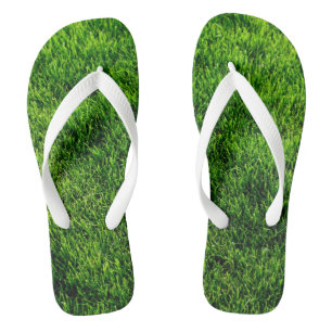 Tongs Texture d'herbe verte d'un terrain de football