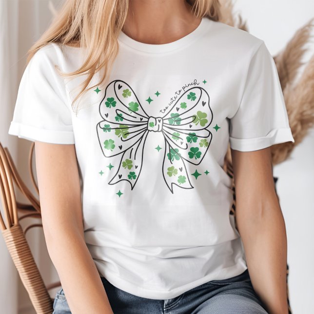 "Too Cute" Vintage Bow with Shamrocks  T-Shirt (Young woman wearing a "Too Cute" Vintage Bow with Shamrocks T-Shirt.)