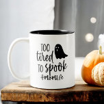 Too Tired To Spook Mom Life Funny Halloween Two-Tone Coffee Mug<br><div class="desc">Embrace the spooky season with a laugh using our "Too Tired To Spook, Mom Life" Funny Halloween Two-Tone Coffee Mug! This charming mug features a sleek black and white design with a humourous phrase in playful typography, perfect for busy moms who need a little Halloween spirit. Crafted from durable ceramic,...</div>
