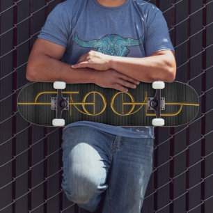 Tool Skateboard – Dark Wood & Golden Elegance