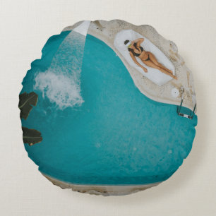 Top-angle photography of outdoor swimming pool round pillow