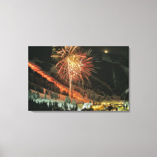 Torchlight parade and fireworks during Winter Canvas Print