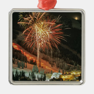 Torchlight parade and fireworks during Winter Metal Ornament