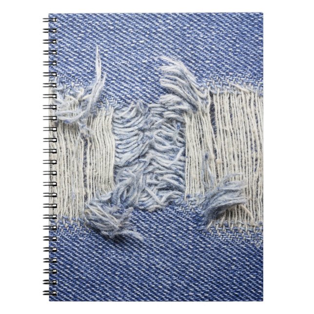 Torn blue denim: jeans texture. notebook (Front)
