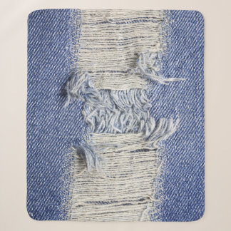 Torn blue denim: jeans texture. sherpa blanket