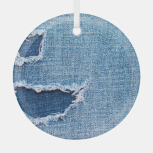 Torn denim fabric texture, blue hues. glass ornament
