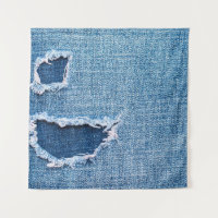 Torn denim fabric texture, blue hues.