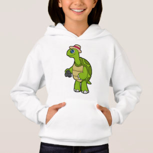 Tortue photographe avec caméra