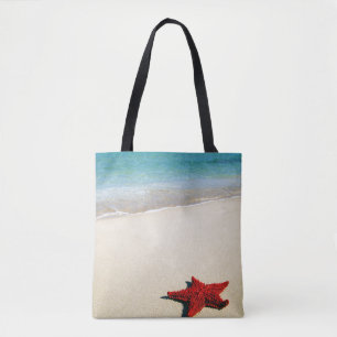 Tote Bag Étoiles de mer rouges sur la plage blanche de