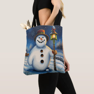 Tote Bag Le bonhomme de neige porte la lampe et erre la nui