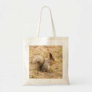 Tote Bag L'écureuil mignon mange une photo de noix