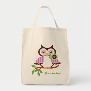 Tote Bag Petite chouette de printemps tenant une fleur dans