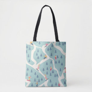 Tote Bag Snowboarders and skiers ride in the ski resort. Pe