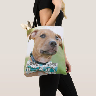 Tote Bag Un chiot Brown porte une cravatte colorée d'arc